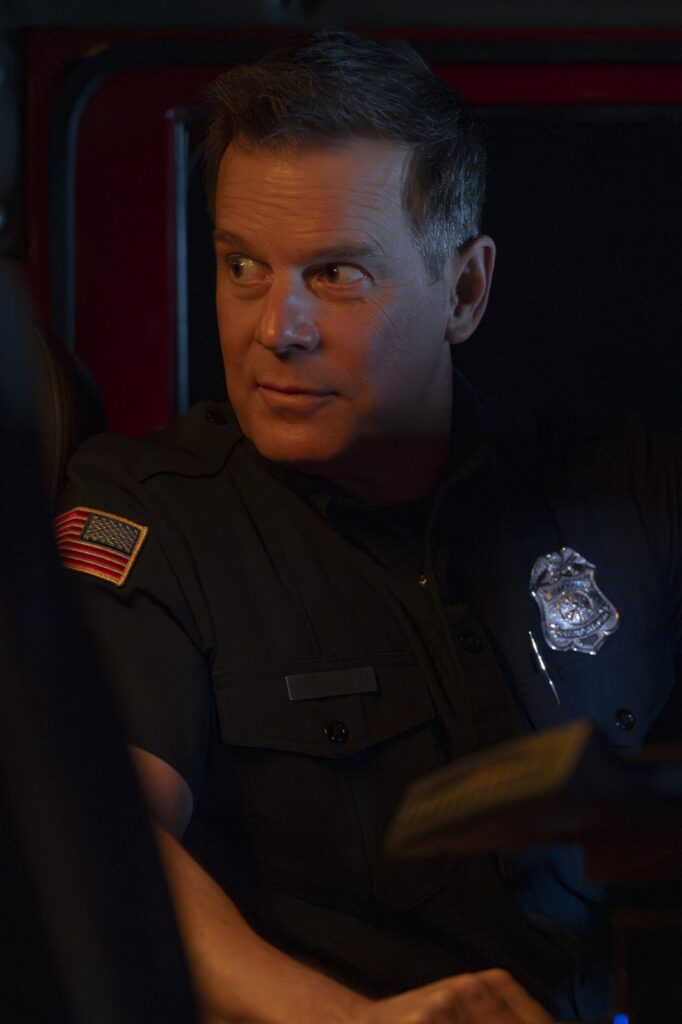 Bobby looks back at Brad in the truck during 9-1-1 Season 8 Episode 3.