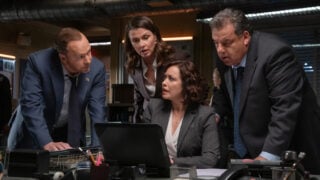 Danny, Baez, Erin, and Anthony look at some information on Baez's laptop to solve the case on Blue Bloods Season 14 Episode 18