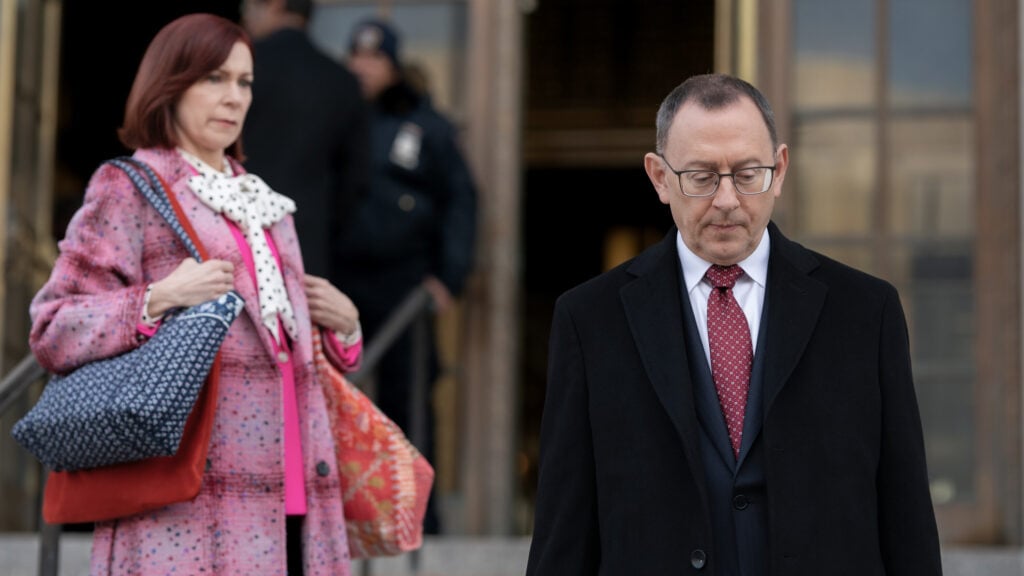 Carrie Preston as Elsbeth Tascioni and Michael Emerson as Judge Milton Crawford