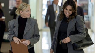 Benson and Rollins walking down a hall together and smiling on Law & Order: SVU Season 26 Episode 3